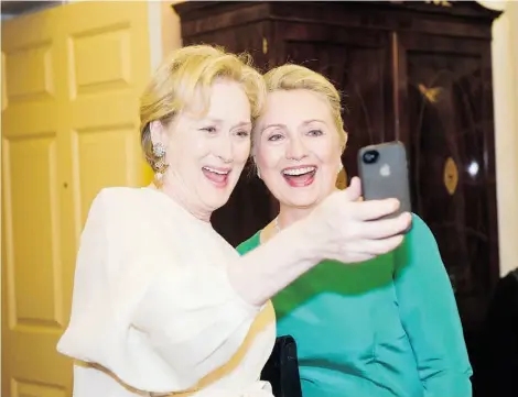  ?? T H E ASS O C I AT E D P R E SS/ F I L E S ?? In this file photo, actress Meryl Streep uses her iPhone to take a selfie of herself and then-secretary of state Hillary Rodham Clinton following a State Department dinner last year in Washington.