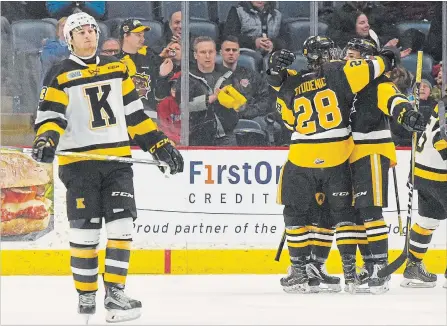  ?? JOHN RENNISON THE HAMILTON SPECTATOR ?? A frustrated Gabriel Vilardi, left, reacts as Hamilton winger Marian Studenic celebrates with Ryan Moore, right, after Moore's second-period goal.