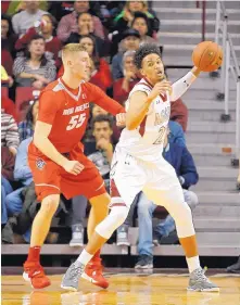  ?? COURTESY OF NEW MEXICO STATE ?? New Mexico State’s Eli Chuha, right, who was named to the All-WAC second team earlier this week, will help lead the Aggies into the conference tournament today.