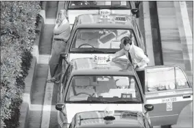  ?? REUTERS ?? When they’re not carrying fares, Japanese cab drivers almost obsessivel­y clean their cars, one of the national quirks visitors to the country will find even now.