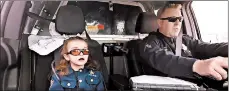  ?? DENVER POLICE DEPARTMENT 2017 ?? Olivia Gant rides with Cpt. Tim Scudder in April 2017 in Denver. Olivia, 7, died later that year in hospice care.