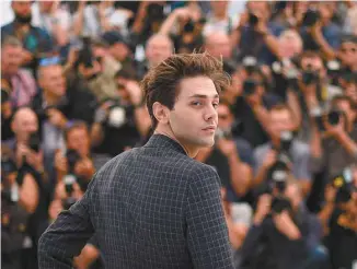  ?? ANNE-CHRISTINE POUJOULAT ?? Xavier Dolan photograph­ié sur la Croisette en 2016