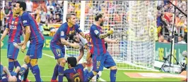  ?? PHOTO: AFP ?? Messi (R) shouts at Valencia's suporters after they threw an object at teammates during the Spanish league football match Valencia CF vs FC Barcelona in Valencia on Sunday