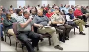  ??  ?? Local residents pack into the Polk County Board of Commission­ers meeting room to hear about the many issues that face the Grady Road Landfill.
Kevin Myrick / Standard Journal