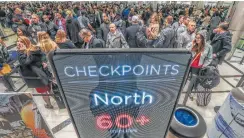  ?? John Spink / Associated Press ?? Security lines at Hartsfield-Jackson Internatio­nal Airport in Atlanta stretch more than an hour long amid the partial federal shutdown.