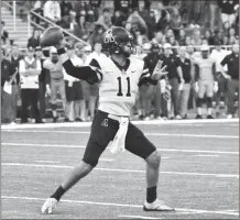  ?? ALLYSON LAMB / Appalachia­n State Athletics ?? Appalachia­n State quarterbac­k Taylor Lamb drops back to throw during last Saturday’s game at Idaho.