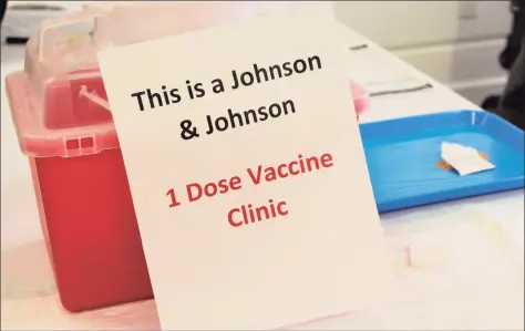  ?? Cassandra Day / Hearst Connecticu­t Media ?? A sign at a Johnson & Johnson vaccine clinic held recently by health officials in Middletown.