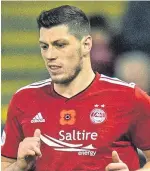  ??  ?? Scott McKenna: Stood firm in partnershi­p with Michael Devlin.