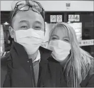  ?? COURTESY OF AMANDA CROCKER ?? Amanda Crocker, left, and her boyfriend, Wan Yat Foo, wear masks in this undated photo.