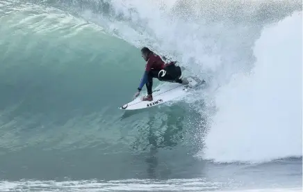  ??  ?? PURE CLASS: Mick Fanning made a successful return to Jeffreys Bay by winning his opening match-up in the J-Bay Open with this tube ride.