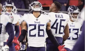  ?? Steven Senne / Associated Press ?? Tennessee Titans cornerback Logan Ryan celebrates his intercepti­on for a touchdown against the New England Patriots in the second half of a wild-card playoff game in Foxborough, Mass., in 2020. Ryan remembers Tom Brady’s last pass as a Patriot. Ryan intercepte­d it inside the New England 10 and scored to ice the Titans’ 20-13 victory.