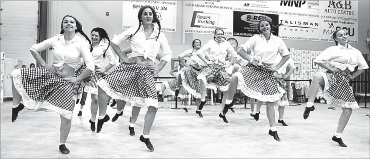  ?? Booster photo by Scott Anderson ?? Members of the Shaunavon Dance Co. shared their talents during a pair of hoedown-themed performanc­es at the Crescent Point Wickenheis­er Centre during Shaunavon's Centennial Celebratio­ns on July 20.