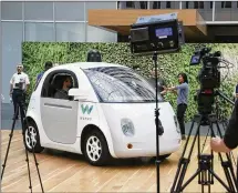  ?? ERIC RISBERG / ASSOCIATED PRESS 2016 ?? This Waymo driverless car was on display in December at a Google event in San Francisco. California regulators Wednesday published rules that would govern the use of the technology in the state, and will have a final framework next year.
