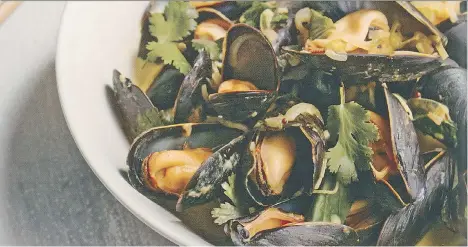  ??  ?? This Thai-style mussel dish also works if you switch up the seafood and opt instead for clams.