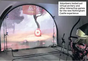  ??  ?? Volunteers tested out virtual archery and other interactiv­e games for the new Nottingham Castle experience