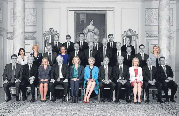  ??  ?? There are only seven other women in Theresa May’s cabinet, as the Government faces calls to guarantee more female representa­tion at Westminste­r.