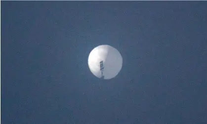  ?? Photograph: Chase Doak/AFP/Getty Images ?? File photo of a suspected Chinese spy balloon over Montana. US officials are reportedly looking at whether it was blown off its intended course.