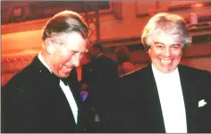  ?? — Courtesy of The Charlotte Symphony ?? Conductor Warren-Green (right) with Prince Charles.