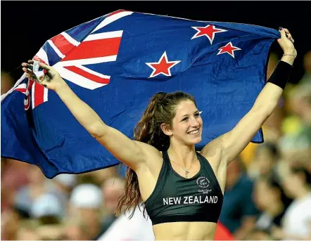  ??  ?? Eliza McCartney celebrates her silver medal on the Gold Coast in 2018.