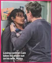  ??  ?? Losing control: Cain takes his anger out on his wife, Moira