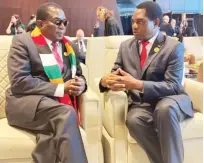  ?? ?? President Mnangagwa converses with his Zambian counterpar­t President Hakainde Hichilema on the sidelines of UN Climate Conference COP27 in Sharm EL-Sheikh Resort City, Egypt, yesterday