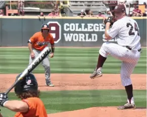  ?? (Photo by Jason Cleveland, SDN) ?? Mississipp­i State pitcher Cole Gordon (24) goes into his windup as an Auburn batter waits on the delivery in Saturday's first game.