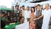  ??  ?? Union Minister Nitin Gadkari flags off the Smart e-rickshaw facility for Metro stations in Gurugram on Monday