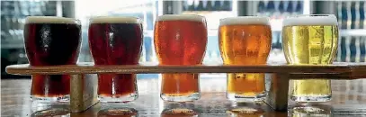  ??  ?? 26092016 NEWS Photo: MARION VAN DIJK/FAIRFAX NZ A tasting tray of beer at McCashins Brewery.