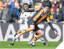  ??  ?? ■ Etienne Capoue and Andrea Ranocchia tussle.