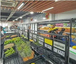  ?? Photo: Charles Chambers ?? Customers shopping at Fresh Choice Supermarke­t in Lautoka.