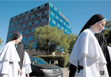  ?? Godofredo A Vásquez / Staff file photo ?? Dominican Sisters of Mary, Mother of the Eucharist protest abortion outside a Planned Parenthood building in Houston in April.