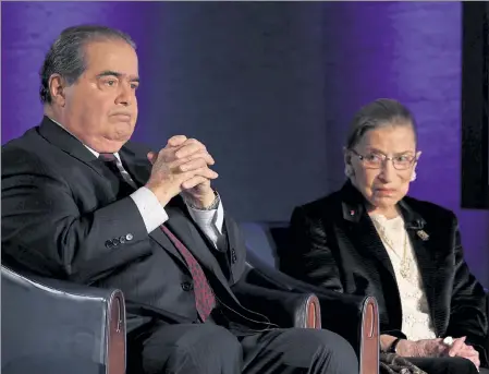  ?? ALEX WONG / GETTY IMAGES NORTH AMERICA ?? WASHINGTON, DC - APRIL 17: Supreme Court Justices Antonin Scalia (L) and Ruth Bader Ginsburg (R) wait for the beginning of the taping of "The Kalb Report" April 17, 2014 at the National Press Club in Washington, DC. The Kalb Report is a discussion of media ethics and responsibi­lity at the National Press Club held each month. (Photo by Alex Wong/Getty Images)