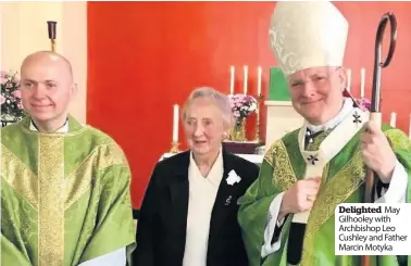  ??  ?? Delighted May Gilhooley with Archbishop Leo Cushley and Father Marcin Motyka