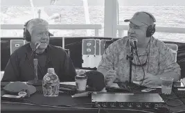  ?? DAVID GOODHUE dgoodhue@miamiheral­d.com ?? Former Miami Dolphins football coach Jimmy Johnson discusses how the Keys continue to recover after Hurricane Irma with Big 105.9 morning radio show host Paul Castronovo during a Nov. 3, 2017, broadcast from the Key Largo Marriott Resort.