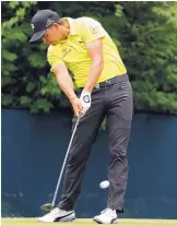  ?? CHARLIE RIEDEL/ASSOCIATED PRESS ?? Rickie Fowler tees off on the ninth hole during his first-round 65. He is searching for his first victory in a major.