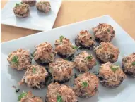  ?? ASHLEIGH SPITZA ?? These Crab-stuffed Mushrooms make an appetizer that's easy on the diet.