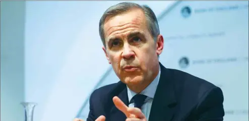  ??  ?? Bank of England governor Mark Carney gestures while speaking during the Financial Stability Report news conference at the central bank in the City of London on November 28. Carney, speaking to lawmakers on Tuesday, denied a suggestion that the BoE’s scenarios on Brexit were rushed out to help May get support for her Brexit plan and stressed that the central bank had been asked to provide them by lawmakers.