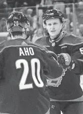  ?? JAMES GUILLORY/USA TODAY SPORTS ?? Jake Guentzel, right, acquired at the trade deadline, had 25 points in 17 regular-season games with the Hurricanes.