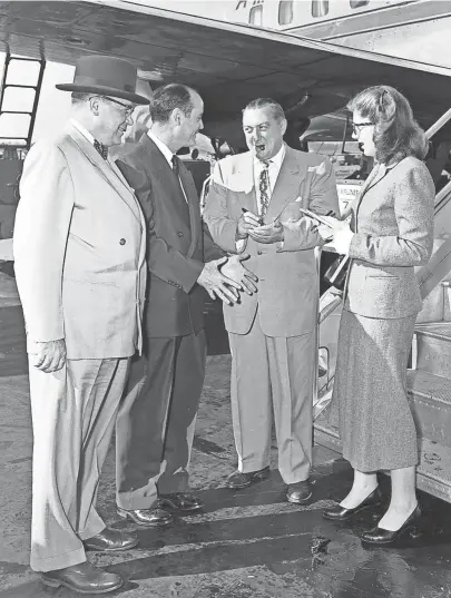  ?? THE COMMERCIAL APPEAL FILES ?? Before joining them for an inspection tour of cotton plantation­s near Greenville, Miss., in October 1951, Ed Lipscomb, second left, director of publicatio­ns for the National Cotton Council, outlined to his companions what they would see. Herbert Caterson, second right, of the Daily News Record, a cotton journal, and Miss Eleanor Nadler, right, of Time magazine took notes while John W. Murray of the American Cotton Manufactur­ing Institute looked on.