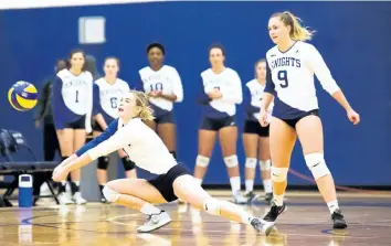  ?? RYAN MCCULLOUGH PHOTO COURTESY NIAGARA COLLEGE ?? Jordan Kozlowski, foreground, shown bumping the ball in this file photo, is the first player in the history of the Niagara College women's volleyball program to be named an all-Canadian.