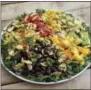  ?? MELISSA D’ARABIAN VIA AP ?? This photo shows a black bean and mango salad in Coronado. This dish is from a recipe by Melissa d’Arabian.