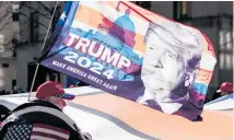  ?? Photo / AP ?? Trump supporters march to Times Square in New York in a rally in March this year.