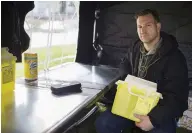  ?? DAX MELMER / POSTMEDIA NEWS ?? Brandon Bailey, a member of the Windsor Overdose Prevention Society, sits in a mock overdose prevention site used for educationa­l purposes in Windsor, Ont.