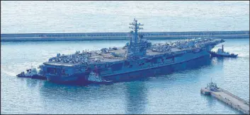  ?? Lee Jin-man
The Associated Press ?? The USS Ronald Reagan arrives in Busan, South Korea, on Sept. 23. North Korea warned Saturday that redeployme­nt of the carrier is causing security tensions.