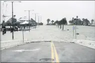  ?? ANNIE RICE — CORPUS CHRISTI CALLER-TIMES VIA AP ?? Peoples Street begins to flood during Hurricane Hanna July 25 in Corpus Christi, Texas.