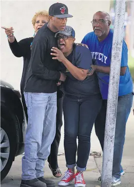  ?? Picture / AP ?? Members of Kingston Frazier’s family were inconsolab­le after hearing of his death.