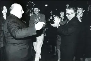  ?? ?? Rauf Denktas dancing with political rival Özker Özgur