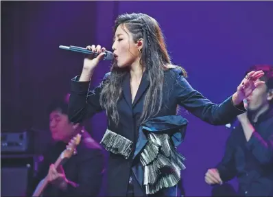  ?? PHOTOS PROVIDED TO CHINA DAILY ?? Taiwan pop singer A Lin performs at the first CMIC Music Awards in Beijing on July 20.