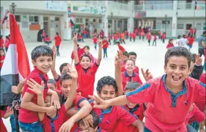  ?? XINHUA ?? Students at a playground of a school, built by the Chinese government, in Shibin al Kawm, Al Minufiyah, Egypt. China is the biggest investor in the developmen­t of Egypt’s Suez Canal Corridor.