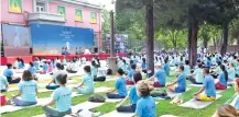  ?? ?? Chinese yoga enthusiast­s performing asanas at the Indian Embassy in Beijing on Saturday